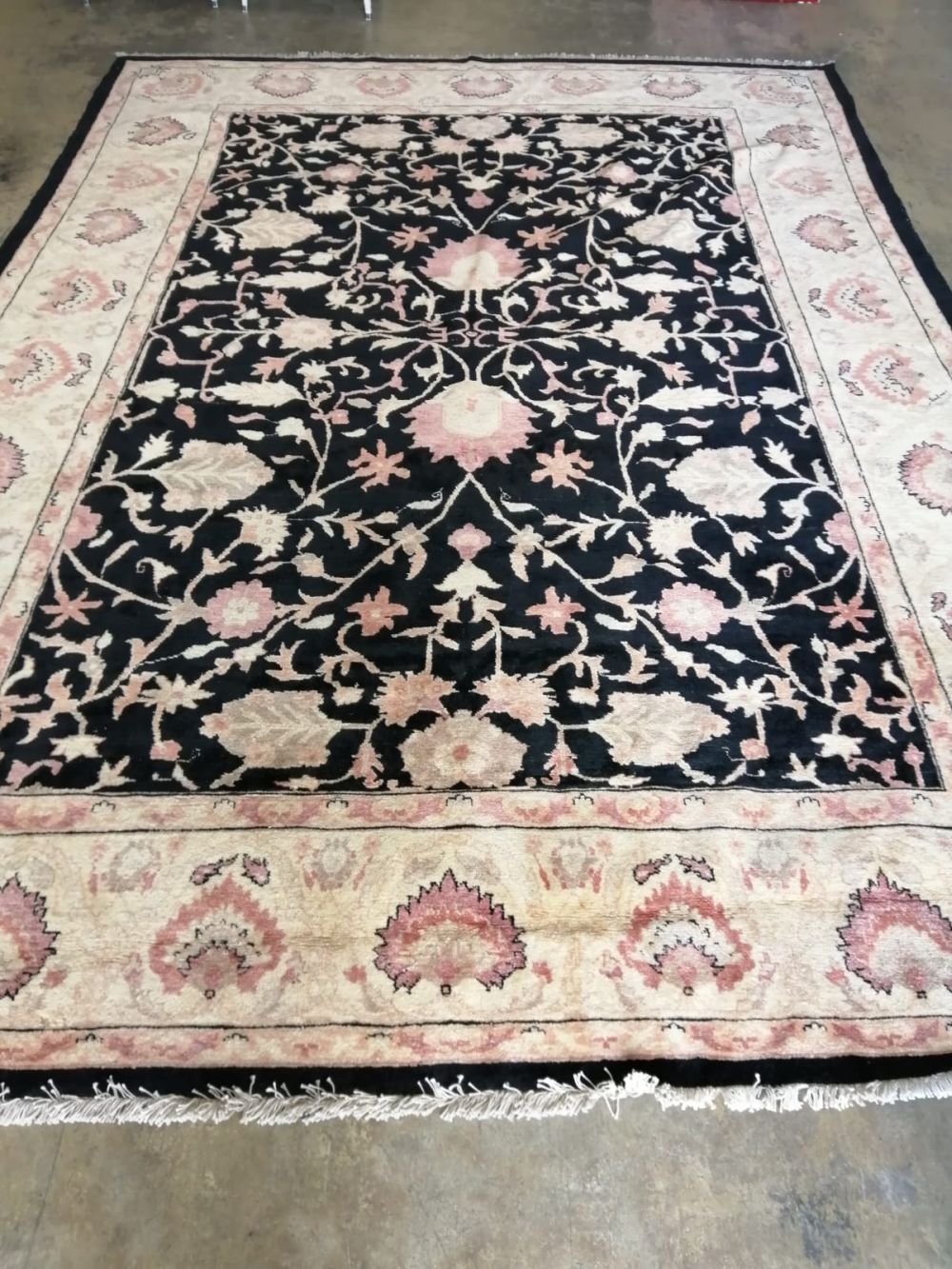 A Ziegler style black ground carpet, 380 x 270cm